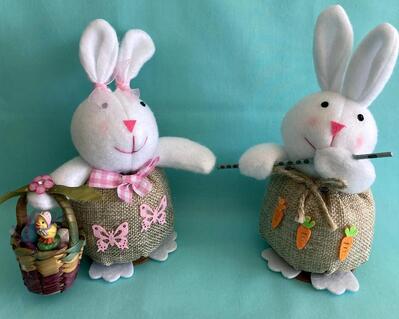 Adorable Easter bunnies the girl carryies a little  basket with eggs and flowers.and the male is playing a flute. These are hand crafted and we made sure to put a small round disc under their feet to keep them from fallins. These other pics show side, back, ears, clothing and add ons we have done.  ENJOY!