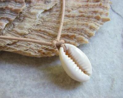Cowrie shell and leather necklace