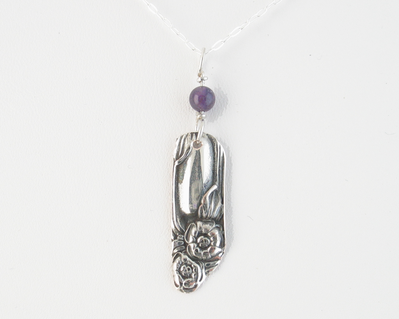 Amethyst bead on small silver flower drop on sterling silver chain necklace