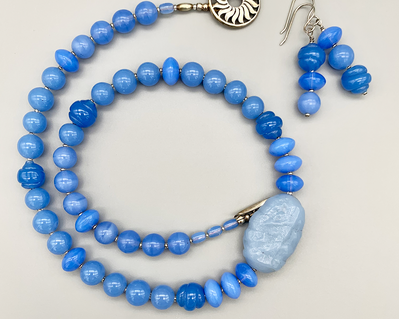 Necklace set | Miriam Haskell focal bead, translucent and opaque cornflower-periwinkle vintage glass beads
