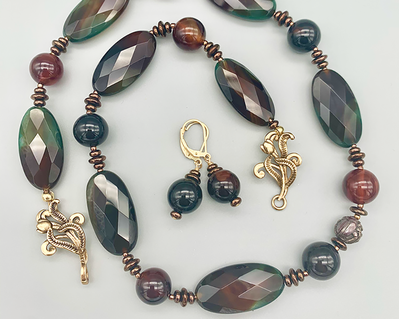 Necklace set | Small bronze scarab bead, large faceted multi-colored agate ovals and rounds