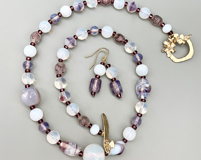 Necklace set | Opalescent white and pale amethyst mid-century glass beads, bronze butterfly/dogwood blossom clasp