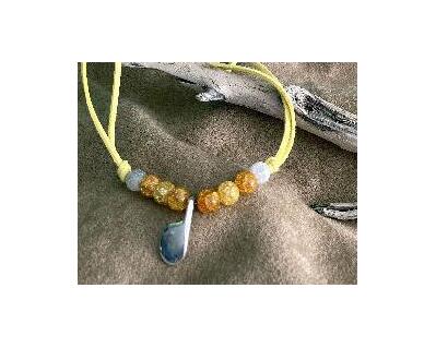 This item is unique in that it is a BoHo necklace with a silver Eb flute key pendant,  Dark yellow crackle beads give depth to the yellow faux suede cord, white beads, and a heart clasp.  This is designed for the young at heart and everyone who lived in the BOHO era of life!  Enjoy