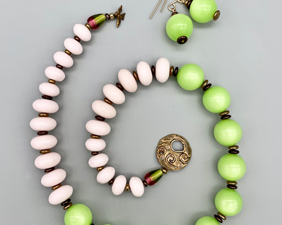 Necklace set | Lime green Lucite rounds, pale pink rondelles, bronze tiny bird artisan clasp