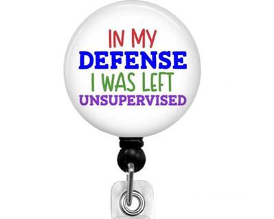 Funny quote on black badge reel.