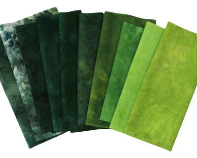 Small cuts of green quilt cotton suitable for applique or crafts