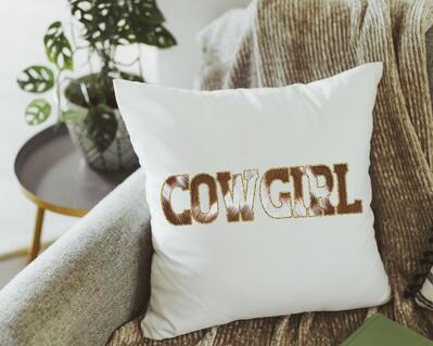Cowhide cowgirl pillow