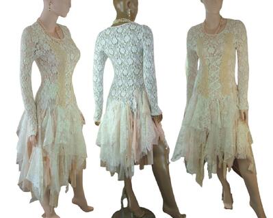 White and peach lace tattered wedding dress. Just below knee length with a lace up front. One of a kind, hand made, eco-friendly boho style wedding dress.