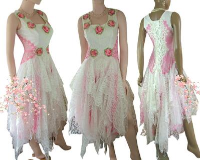 Pink red and white lace tattered wedding dress with a lace up back. Crochet bodice with pink roses. One of a kind, hand made, eco-friendly bohemian style dress.