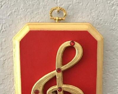 Out plaque with treble clef and crystals is completely handmade from beginning to the end.  Treble clef is attached to thick routed plaque and painted with 18k gold paint.  Crystals accent the clef and the 3D effect combines all avenues into one . Lovely for wall decor in any place it may be.