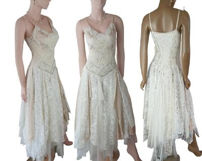 Long cream tattered lace up wedding dress. Lace and vintage bling, one of a kind, handmade, eco-friendly, boho style wedding dress.