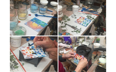 Colorful transparent enamels are sifted onto the white surface, and fired again. Adhesive sprayed again, leaves are laid onto the surface, and white enamel is sifted over the leaves as a reverse stencil pattern. Leaves are carefully removed, a little touch-up with tiny brush and toothpick, then back into the kiln for final firing. A little sanding and buffing on the edges - and voila! A double light switch cover plate in a beautiful Sunrise pattern. Colorful transparent enamels are sifted onto the white surface, and fired again. Adhesive sprayed again, leaves are laid onto the surface, and white enamel is sifted over the leaves as a reverse stencil pattern. Leaves are carefully removed, a little touch-up with tiny brush and toothpick, then back into the kiln for final firing. A little sanding and buffing on the edges - and voila! A double light switch cover plate in a beautiful Sunrise pattern.