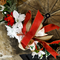 Snowman bicycle wheel wreath close up bow and flowers