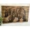 This is a large wood statement piece. It features a wood-burned bear that has a forest scene drawn inside of it. It is three feet wide. 