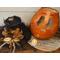 This shows the pumpkin gourd with the hat off and sitting beside it. You can see the inside of the gourd is unfinished. 