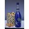 Hand painted blue bottle with various dot art/mandala designs around the entire bottle
