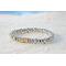 Magnetic bracelet handcrafted with silver metallic magnetic hematite beads. It is secured with a strong and easy-to-use magnetic clasp.
