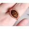 Copper Wire Wrapped Fire Agate Gemstone Ring on Finger