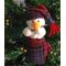 A cdute plush flutist who keeps warm in his wool mitten and hat.  These are wonder tucked into park of a tree limb. He is another little snowman looking for a home.  Are you available?  He would be so happt!