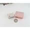 photo ofminiature silver trinket box next to a copper trinket box to show size difference.