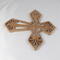 This Ten-Inch Rustic Fretwork Christian Cross Wall Hanging Art is handcrafted from reclaimed wood. Its intricate fretwork design adds unique texture and character, blending rustic charm with elegant design. It is a perfect focal point for any room.
