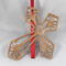This Ten-Inch Rustic Fretwork Christian Cross Wall Hanging Art is handcrafted from reclaimed wood. Its intricate fretwork design adds unique texture and character, blending rustic charm with elegant design. It is a perfect focal point for any room.