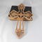 This Ten-Inch Rustic Fretwork Christian Cross Wall Hanging Art is handcrafted from reclaimed wood. Its intricate fretwork design adds unique texture and character, blending rustic charm with elegant design. It is a perfect focal point for any room.