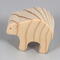 This wooden toy bear is a part of my Itty Bitty Animals Collection and has been handmade in America. It is unfinished, freestanding, and can be stacked. The toy is made using traditional woodworking tools, sanded smooth, and is ready to be painted.