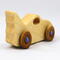 Handmade wooden toy bat car with a clear and amber shellac finish and metallic sapphire blue trim, part of my Play Pal Collection
