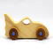 Handmade wooden toy bat car with a clear and amber shellac finish and metallic sapphire blue trim, part of my Play Pal Collection