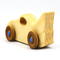 Handmade wooden toy bat car with a clear and amber shellac finish and metallic sapphire blue trim, part of my Play Pal Collection