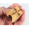 A wooden miniature birdhouse Christmas tree ornament shaped like a tulip, made from light beige wood, with a small dark reddish-brown bird perched at the entrance. It features a gold-colored hanging loop on top.