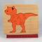 Handmade Wood Dinosaur Tray Puzzle with Amber Shellac and Orange Paint Finish. Freestanding and Versatile Toy for Kids of All Ages, Crafted in the USA with Traditional Woodworking Tools.