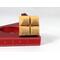 The wooden miniature Birdhouse Ornament is shaped like a heart. A small, dark-reddish-brown bird is perched on the front of the birdhouse. The heart-shaped structure has a pointed bottom that tapers down to a fine point. The wood is light beige.