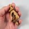 Handmade Wood Birdhouse Ornament Collectable Christmas Tree Ornament shapeed like a Christmas tree. Made from select-grade hardwoods, hand-sanded, and finished with a custom blend of oils and waxes using traditional woodworking tools.