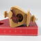 Handmade Wood Birdhouse Ornament Collectable Christmas Tree Ornament shapeed like a Christmas tree. Made from select-grade hardwoods, hand-sanded, and finished with a custom blend of oils and waxes using traditional woodworking tools.