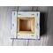 Photo of back of small square canvas