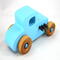 This handmade wooden toy car, modeled after a 1927 Ford T-Coupe, is hand-painted baby blue with black and metallic sapphire blue. The wheels are finished with nonmarring amber shellac.