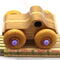 This handmade wood toy truck is a unique and durable addition to any child's playroom. Made from three laminations of oak and poplar hardwoods and finished with satin polyurethane, amber shellac, and metallic purple paint. This toy pickup truck will withstand rough-and-tumble play. With a focus on quality, each toy is carefully assembled and tested, with only the highest quality materials used in the construction process.