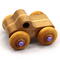 This handmade wood toy truck is a unique and durable addition to any child's playroom. Made from three laminations of oak and poplar hardwoods and finished with satin polyurethane, amber shellac, and metallic purple paint. This toy pickup truck will withstand rough-and-tumble play. With a focus on quality, each toy is carefully assembled and tested, with only the highest quality materials used in the construction process.