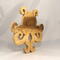 A handcrafted octopus puzzle made from wood. The puzzle is freestanding and can comfortably sit on a shelf, table, window sill, or door frame.
