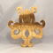 A handcrafted octopus puzzle made from wood. The puzzle is freestanding and can comfortably sit on a shelf, table, window sill, or door frame.