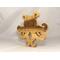 A handcrafted octopus puzzle made from wood. The puzzle is freestanding and can comfortably sit on a shelf, table, window sill, or door frame.