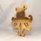A handcrafted octopus puzzle made from wood. The puzzle is freestanding and can comfortably sit on a shelf, table, window sill, or door frame.