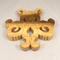 A handcrafted octopus puzzle made from wood. The puzzle is freestanding and can comfortably sit on a shelf, table, window sill, or door frame.