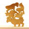Handmade wooden toy stacking puzzle with five freestanding goats finished with a custom blend of nontoxic oils and waxes.