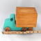 This handmade wooden toy truck is a box truck or moving van, painted in your choice of several colors. The wheels and body of the truck are finished with shellac.