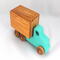 This handmade wooden toy truck is a box truck or moving van, painted in your choice of several colors. The wheels and body of the truck are finished with shellac.