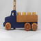 This handmade wooden Lorry truck is finished with navy blue acrylic paint and Amber Shellac. It is one of five towable trucks in this collection, available in many colors and unfinished. Custom Orders are welcome.