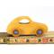 A handmade wooden toy car is hand-finished with amber shellac with metallic sapphire blue acrylic paint trim. The car body is made from hardwood plywood. The wheels and axles are made from birch hardwood. It is part of my Play Pal Collection.